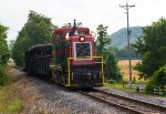 EBT m-7 and the excursion train at Enyart Road grade crossing